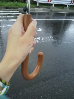 ���߂���